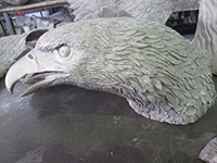 Finished eagle's head after bronze casting, before color applied.  'The Eagle Has Landed' bronze sculpture by Miles Tucker.